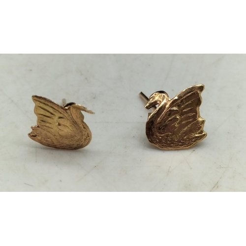 552 - 375 Gold Swan Earrings.