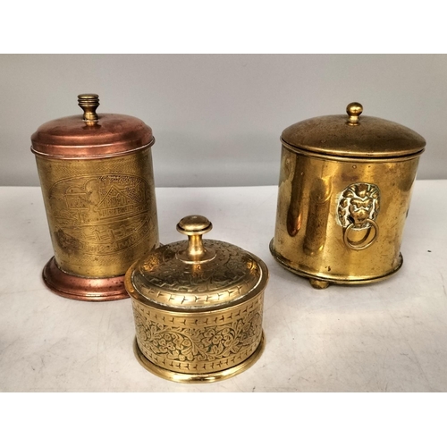 557 - Brass and Copper Tea Caddies (3). Tallest being 12cm.