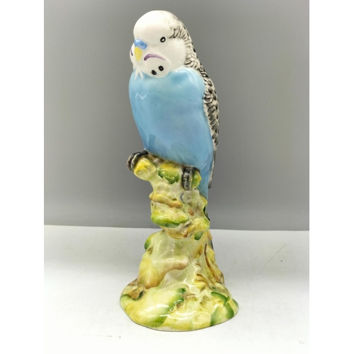 58 - Beswick Figure of a Blue Budgie No 1217. 18cm High.