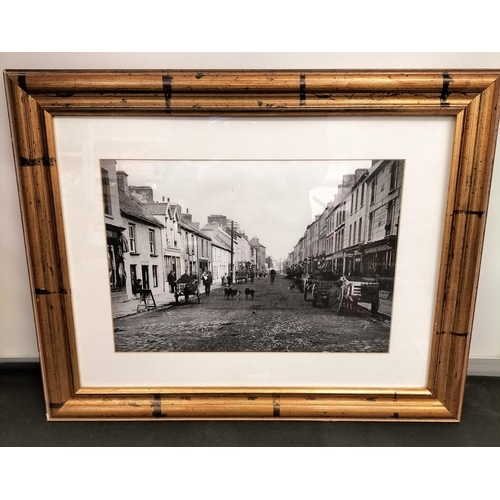 609 - Framed and Glazed Late Victorian/Edwardian Street Scene. 60cm x 48cm. This Lot is Collection Only.