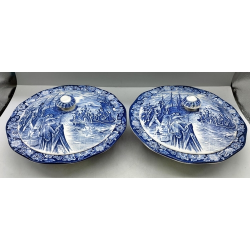 61 - Staffordshire Ironstone Liberty Blue 24cm Covered Tureens 'Boston Tea Party' (2). Chip to 1 Lid.