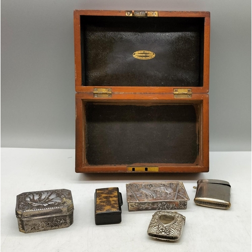 69 - Wooden Box with Contents including Vestas, Snuff Box, etc. Box measures 20cm x 19cm x 9cm.