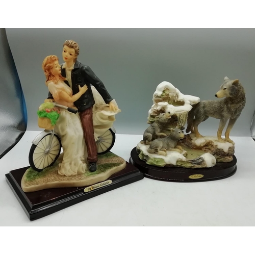 796 - Juliana Collection Figures (2) - Wolves by a Waterfall and Man and Woman on Bike. Tallest being 25cm... 