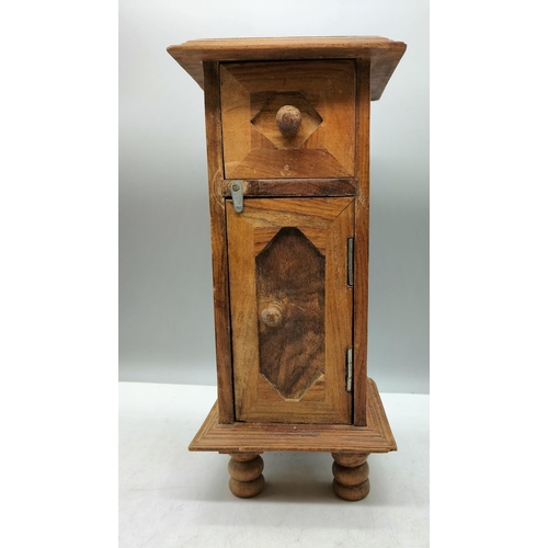 82 - Miniature Cupboard. 33cm high, 15cm x 16cm.