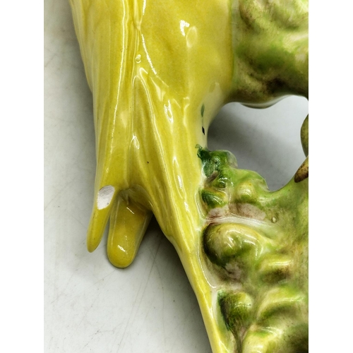 90A - Rare Beswick Figure of a Yellow Budgie No 1217. 18cm High. Nip to Wing Tip.