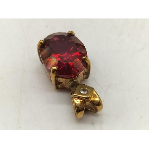 20 - 9ct Gold Ruby and Diamond Pendant. Marked 375. All Stones Tested by Vendor.