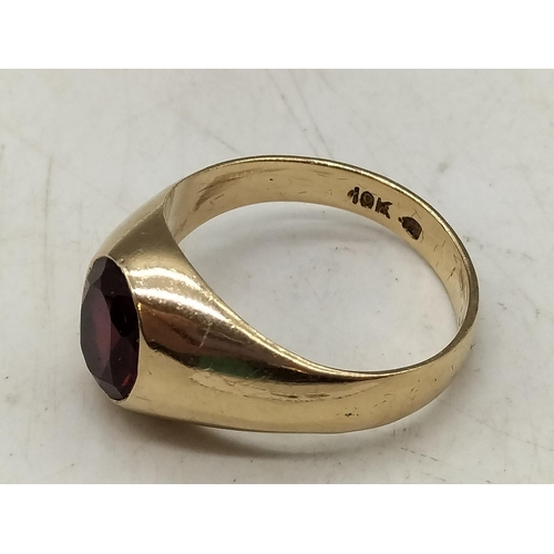 42 - 10k Gold Ruby Stone Signet Ring. Size U. 5.24 Grams.