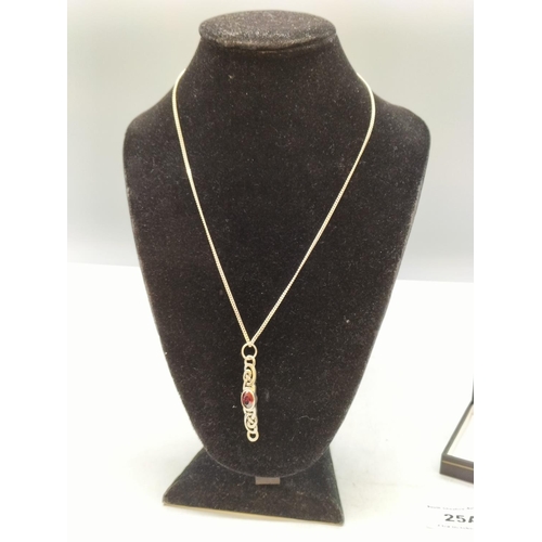 25A - 925 Silver Chain with Celtic Design and Red Stone Pendant.