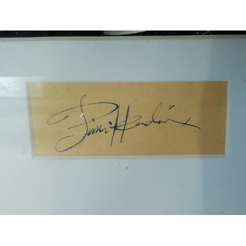 1 - Jimi Hendrix signed, A black and white photo of Hendrix framed and mounted with a cut autograph (pos... 