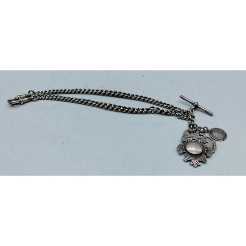 122 - Graduated Double Albert Watch Chain with 2 Silver Coins and 2 Silver Fobs. 64 Grams