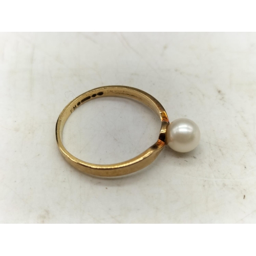 128 - 9ct Gold and Pearl Ring. 1.4 Grams. Size N