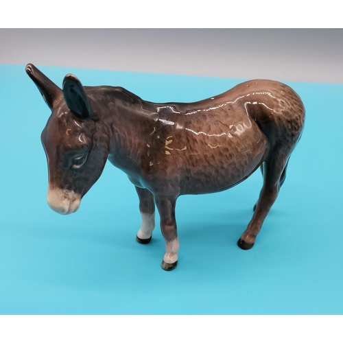 151 - Beswick Figure of a Donkey. 14cm x 11cm.