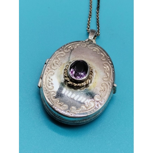 278 - Silver Locket set with Amethyst Stone.