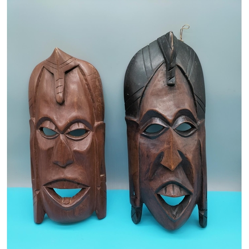 370 - Wooden African Face Masks. Largest being 36cm.