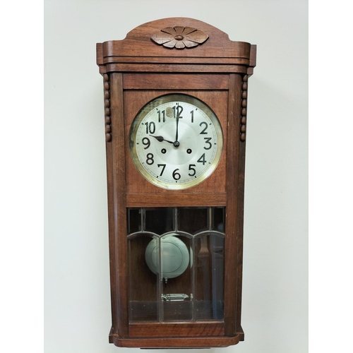 376 - Junghans Oak Cased Pendulum Wall Clock W/O. Requires Attention to Chime. 77cm High x 33cm x 18cm.