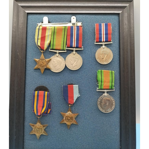 379 - Framed World War II Medals. 35cm x 26cm.