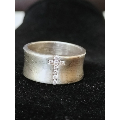 711 - 925 Silver Ring set with Cubic Zirconia Stones in the Form of a Cross.