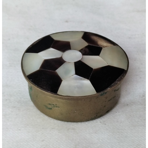 715 - Round Brass Box inlaid with Mother of Pearl and Tortoise Shell. 3.5cm Diameter.