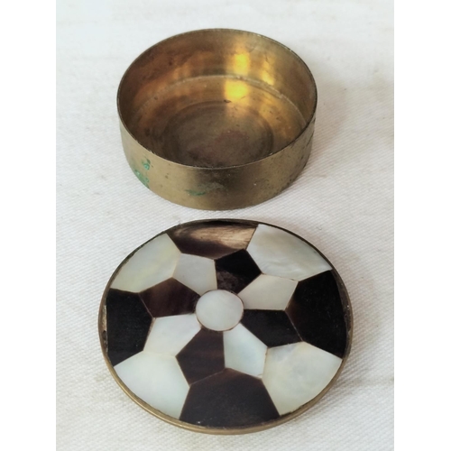 715 - Round Brass Box inlaid with Mother of Pearl and Tortoise Shell. 3.5cm Diameter.