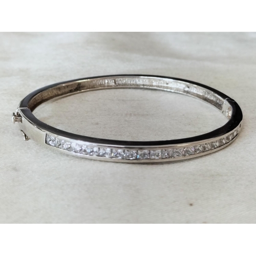 725 - Hallmarked Silver Bangle set with Cubic Zirconia. Boxed.