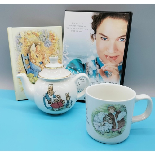 730 - Beatrix Potter Items to include Wedgwood Peter Rabbit Teapot and Mrs Tiggy Winkle Mug, Photo Album a... 