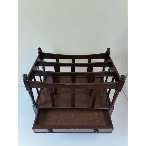 1 - Wooden Canterbury Magazine Rack with Drawer on Brass Castors. 56cm x 35cm x 54cm. This Lot is Collec... 