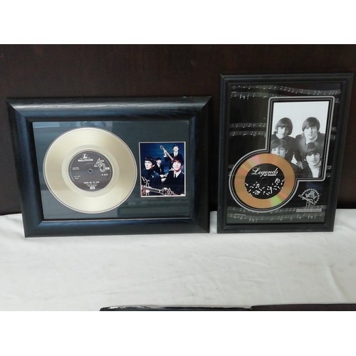 7 - A Nice collection of Beatles Ephemera to include 2 collectors editions gold disc, books and DVD