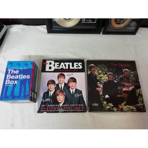 7 - A Nice collection of Beatles Ephemera to include 2 collectors editions gold disc, books and DVD