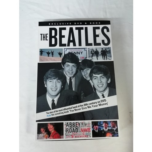 17 - Collection of Beatles memorabilia to include 4 still sealed dvd, pencil sketch print of Jon Lennon, ... 