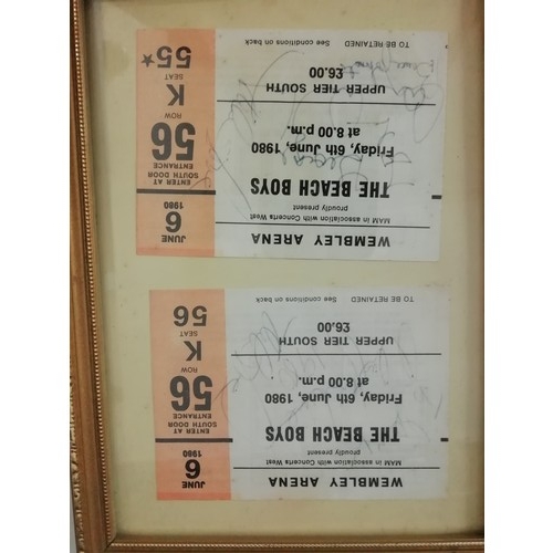 37 - The Beach Boys a nice collection  of ephemera to include a framed pair of concert Tickets signed  by... 