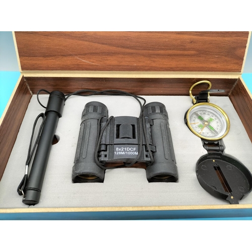 161 - Boxed Set of Binoculars, Compass and Torch. Box measures 27cm x 16cm x5cm.