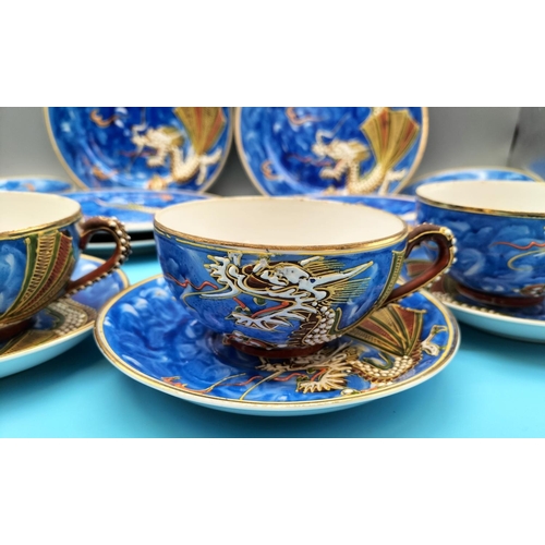 22 - Japanese Geisha Girl (Face in Bottom of Cups) 21 Piece Tea Set with a Dragon Design.