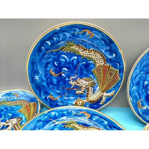 22 - Japanese Geisha Girl (Face in Bottom of Cups) 21 Piece Tea Set with a Dragon Design.