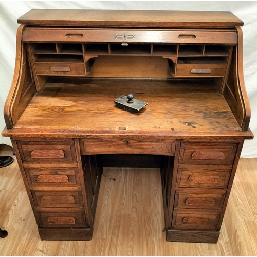 40 - Small Oak Knee Hole, Roll Top Desk. 112cm High, 107cm x 67cm. This Lot is Collection Only.