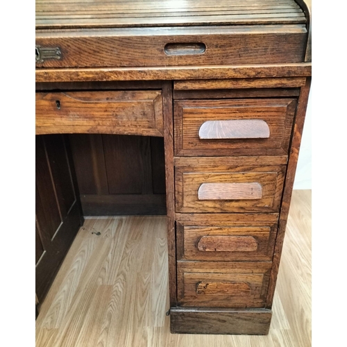 40 - Small Oak Knee Hole, Roll Top Desk. 112cm High, 107cm x 67cm. This Lot is Collection Only.