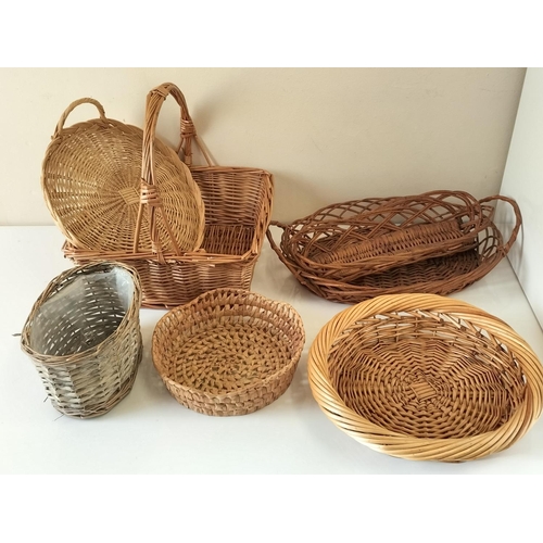 727 - Quantity of Wicker Baskets (7). Largest being 34cm x 33cm x 34cm.