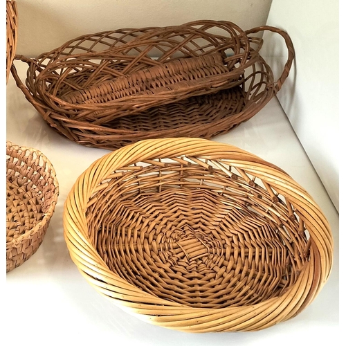 727 - Quantity of Wicker Baskets (7). Largest being 34cm x 33cm x 34cm.