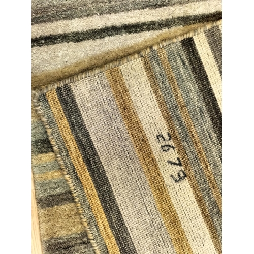 454 - Woven Multi Striped Rug. 120cm x 180cm. This Lot is Collection Only.