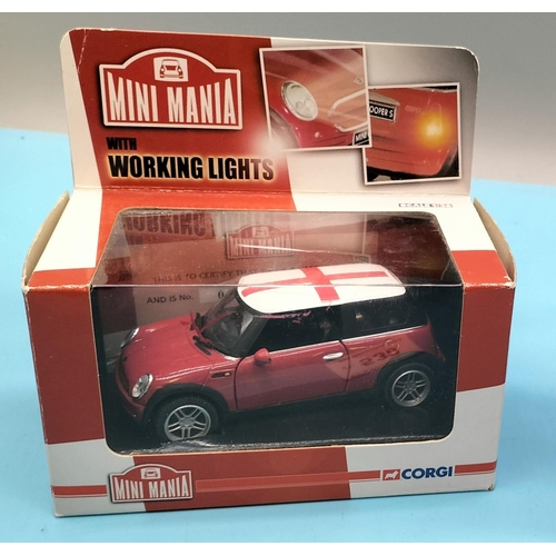 530 - 2 x Boxed Corgi Mini Mania (1 Red, 1 Blue).