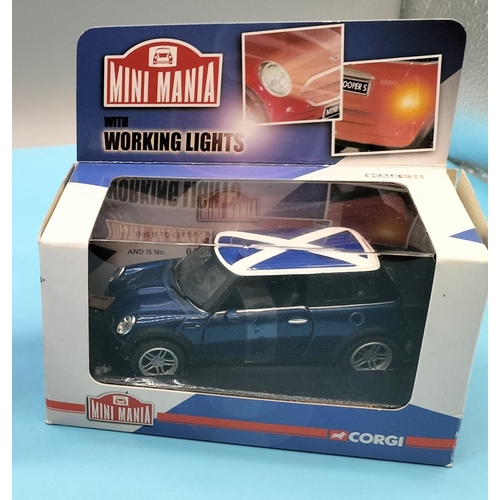 530 - 2 x Boxed Corgi Mini Mania (1 Red, 1 Blue).