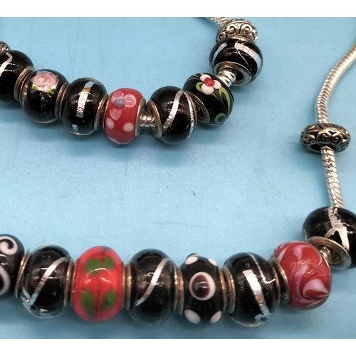 600 - European Style Necklace (50cm) and Bracelet (19cm) stamped 925 with Murano Glass Beads.