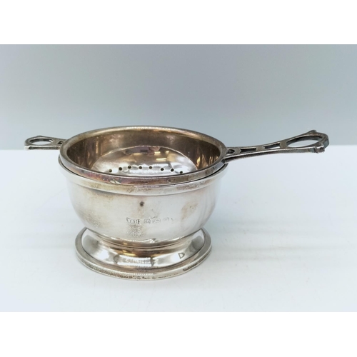 253 - Silver Hallmarked Tea Strainer and Drip Pot by Walker & Hall, Birmingham, 1920.