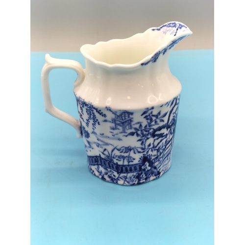 373 - Royal Doulton Blue and White Jugs (2) plus Royal Crown Derby Blue and White Jug. Tallest being 15.5c... 