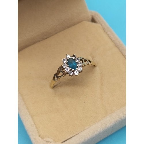 399 - 9ct 375 Gold Ring set with Aquamarine and Cubic Zirconia Stones. Size R. 1.3 Grams.