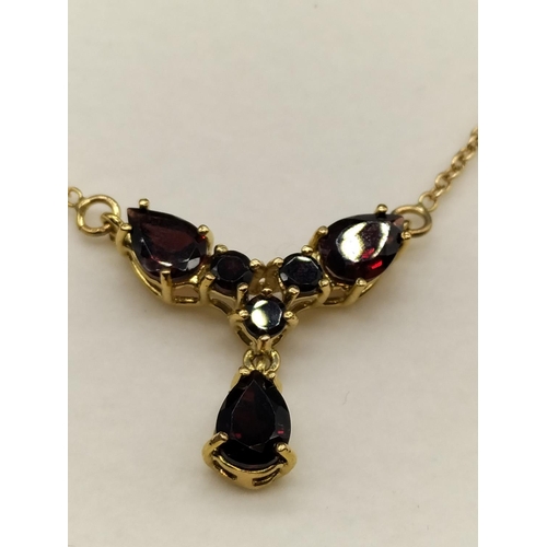 531 - 18ct Gold Garnet Earring and Necklace Set.