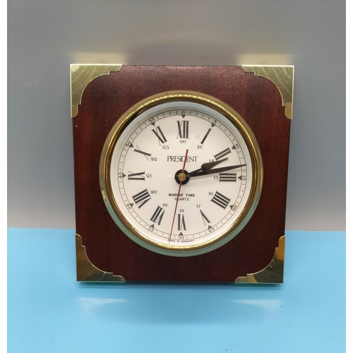 556 - Brass and Wood Mounted President Marine Time Quartz Clock. 17cm x 17cm.