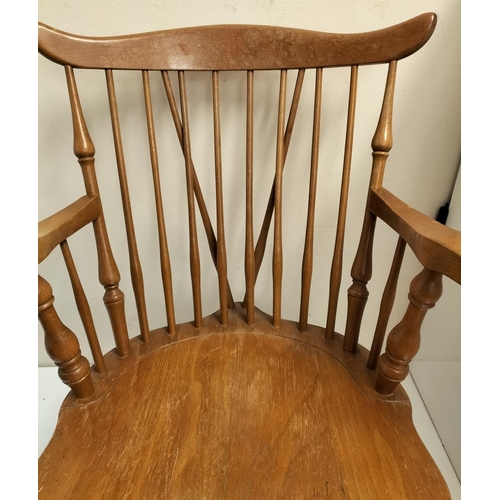 560 - Wooden Spindle Back Rocking Chair. Made in Yugoslavia. 83cm High, 54cm x 62cm. Seat Height 40cm. Thi... 