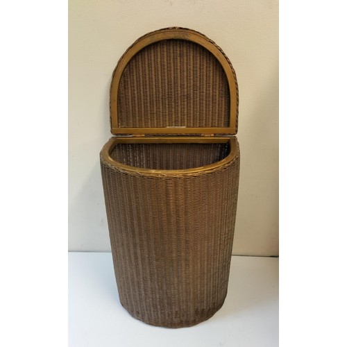 634 - LLoyd Loom Laundry Basket. 54cm High, 29cm x 38cm. This Lot is Collection Only