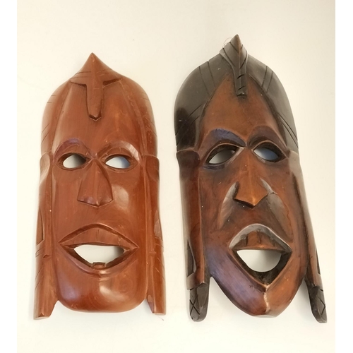 291 - Wooden African Masks (2). 28cm x 17cm.