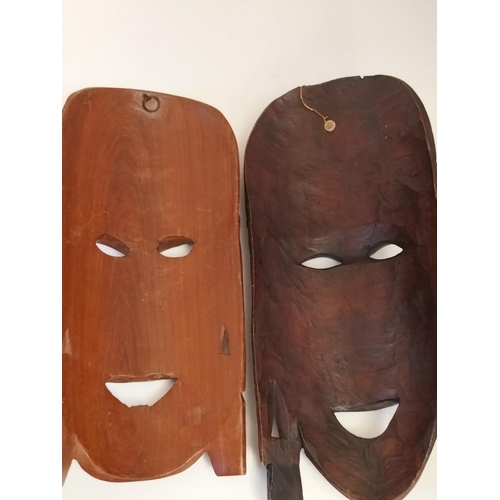 291 - Wooden African Masks (2). 28cm x 17cm.